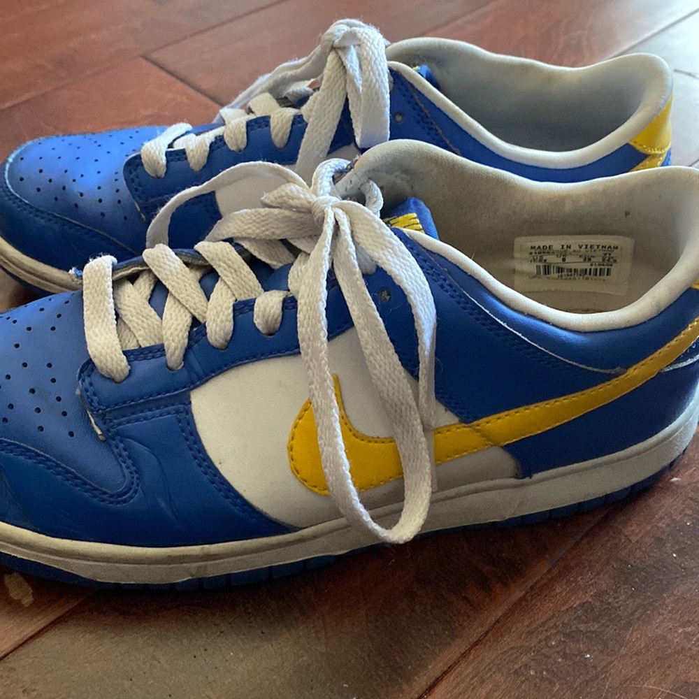 Blue and yellow vintage Nike woman’s shoes. Great condition